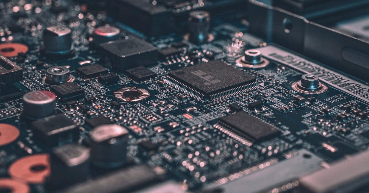 Circuit board technology representing the difference between AI systems and point-to-point tools